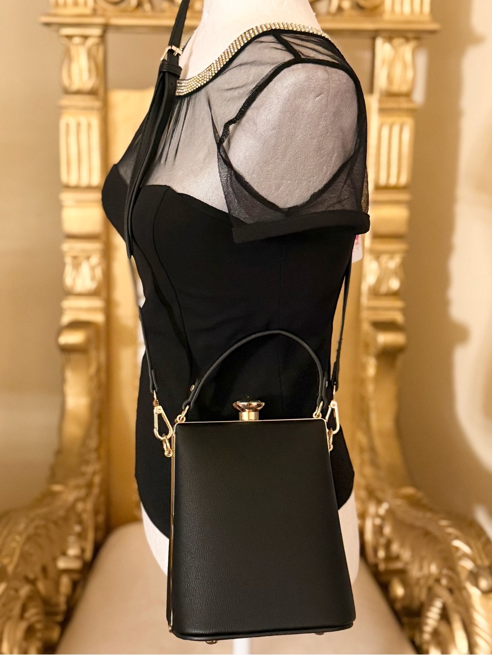 Elegant Black Top-Handle Crossbody Bag with Crystal Closure